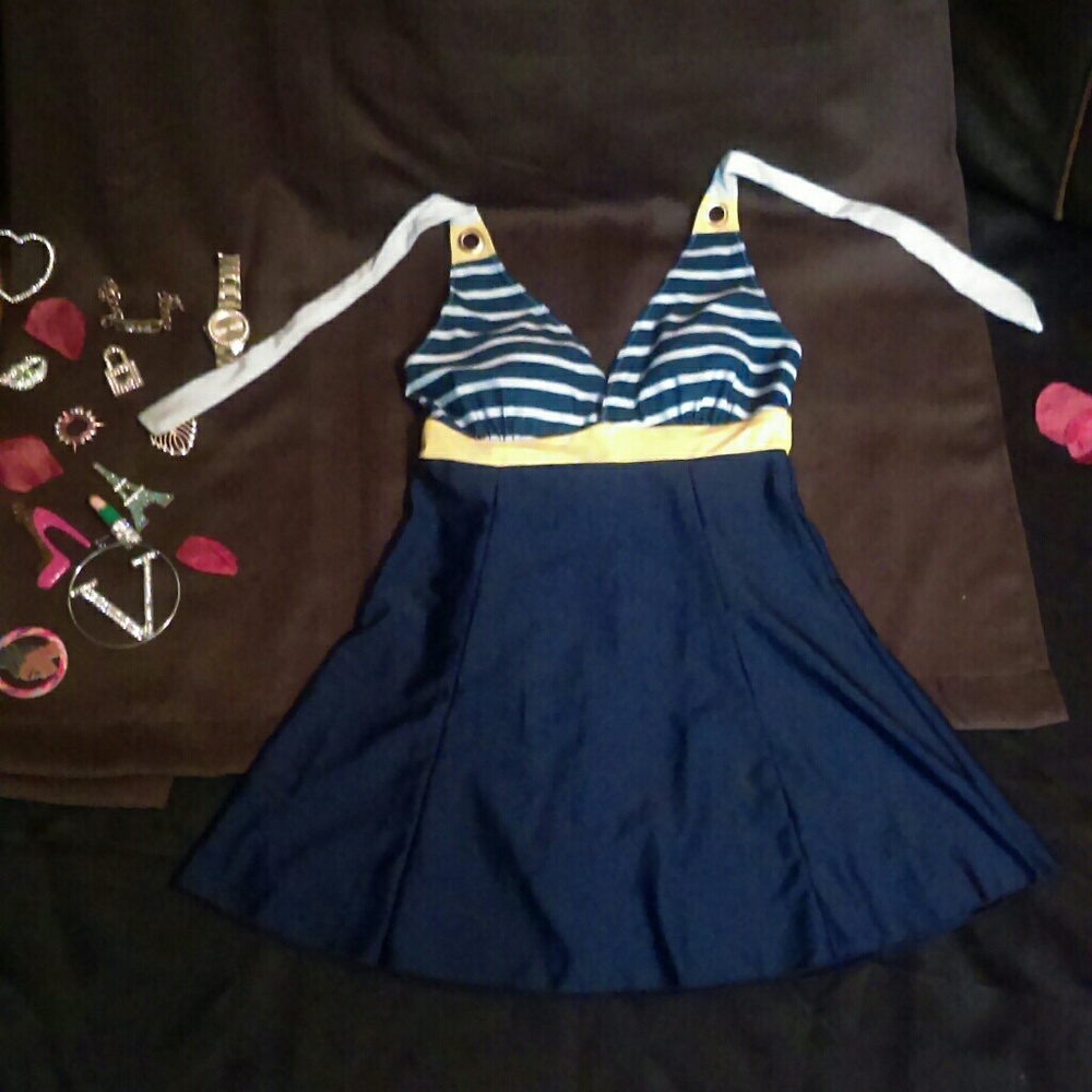 Flirty, extra layered swimwear. New, never worn.